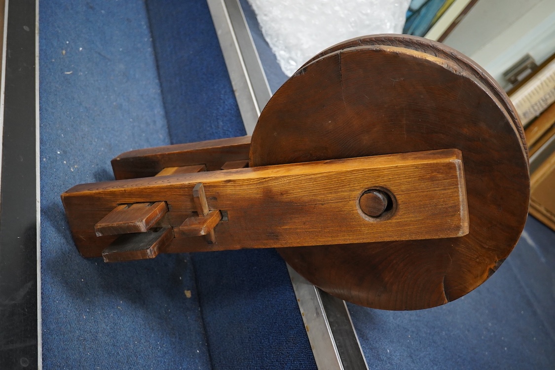 A large 19th century Japanese wood pulley, 62cm wide